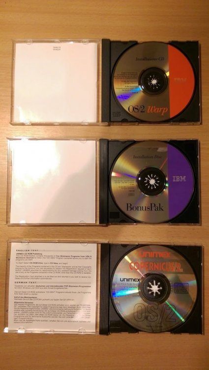 ibm_os2_warp3_opened_cd.thumb.jpg.1a982789b4a46bf2d45b37ede1af801d.jpg